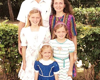 The Agnew family, in Bonne Fin, Haiti around 1994. Scott Agnew, M.D., wife Sandi Agnew, daughters Kristen, Jenna, Lauren.