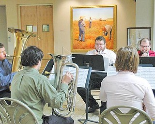 The College of Fine and Performing Arts - Dana Concert Series presents Music at Noon Concert Series kicked off at the Butler Institute of American Art as part of the Brown Bag Concert series , Every Wednesday at Noon at the Butler . Today was Chamber Music for Brass Quintets.- starting closest to camera in the pink is Deborah McDowell- Andrew Barnes- (green)- Eric Jernigan Frederick Moose and David Gardner.