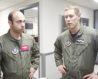 Pilot/Major Joe George of Pittsburgh and his co-Pilot First Lieutenant Steve Stroney of Liberty talk about their flight .