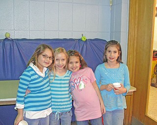 Friends take a break from bingo to enjoy refreshments provided by the Watson PTA. From left, Isabella Bindas, 7, Haley Molynarski, 7, Morgan Reed, 7, and Shannon Carr, 7. 

                               