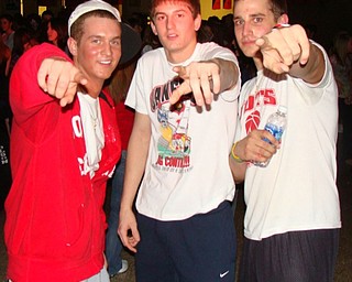 Nick Benson (left), Matt Costello (center) and Michael Podolsky  take a break from dancing to strike a pose for the camera during the Jan. 18 Sock Hop at Canfield High School.                