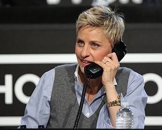In this image released by Hope for Haiti Now,  Ellen DeGeneres works the phone bank at the "Hope for Haiti Now: A Global Benefit for Earthquake Relief", on Friday, Jan. 22, 2010 in Los Angeles. (AP Photo/Mark Davis/Hope for Haiti Now)