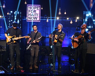 In this image released by Hope for Haiti Now, Coldplay performs at the "Hope for Haiti Now: A Global Benefit for Earthquake Relief", Friday, Jan. 22, 2010 in London. (AP Photo/MJ Kim/Hope For Haiti Now)