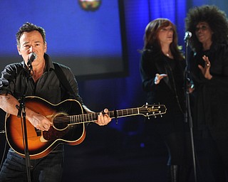 In this image released by Hope for Haiti Now, Bruce Springsteen performs on "Hope for Haiti Now: A Global Benefit for Earthquake Relief", on Friday, Jan. 22, 2010, in New York. (AP Photo/Evan Agostini/Hope for Haiti Now)