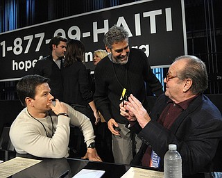 In this image released by Hope for Haiti Now, actors, from left, Mark Wahlberg, George Clooney, and Jack Nicholson are shown at "Hope for Haiti Now: A Global Benefit for Earthquake Relief", on Friday, Jan. 22, 2010, in Los Angeles. (AP Photo/Mark Davis, Hope for Haiti Now)