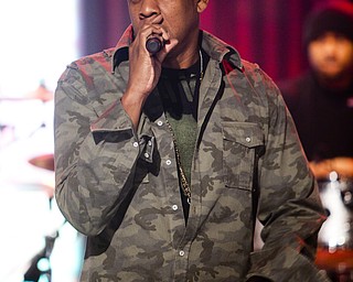 In this image released by Hope for Haiti Now, Jay-Z performs at "Hope for Haiti Now: A Global Benefit for Earthquake Relief", Friday, Jan. 22, 2010 in London. (AP Photo/MJ Kim/Hope For Haiti Now)