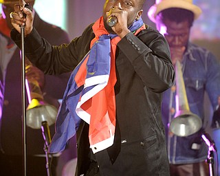 In this image released by Hope For Haiti Now, Wyclef Jean performs at "Hope for Haiti Now: A Global Benefit for Earthquake Relief", on Friday, Jan. 22, 2010 in New York. (AP Photo/Evan Agostini/Hope for Haiti Now)