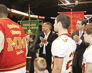 Coach P.J. Fecko and his football team at Mooney High School and Coach Dan Reardon with his team at Ursuline High School were honored at Covelli Centre by officials representing the City of Youngstown and the State of Ohio for bringing State Championship trophies home to the valley. 