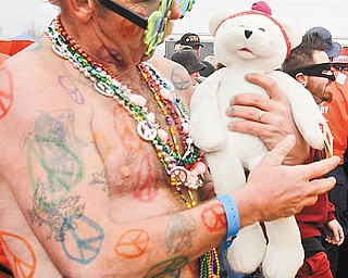 The Vindicator/Lisa-Ann Ishihara --.Ken Merwin of Bazetta dressed up to take the plunge into Mosquito Lake for the FreezinÕ for a Reason Polar Bear Plunge to benefit Special Olympics Ohio.