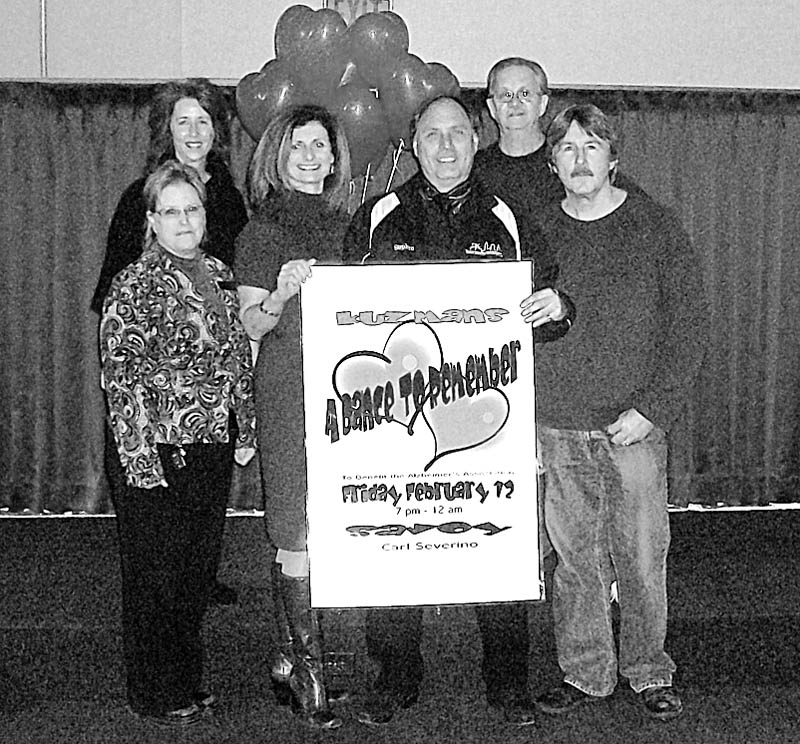 Special to The Vindicator
SIGN OF THE TIMES: Among those displaying a sign announcing a benefit “Dance to Remember” to take place from 7 p.m. to midnight on Feb. 12 at Kuzman’s in Girard are, from left, Brenda Williams, Debbie Lavelle, Susan Ryan, Stephen Barba, Larry Maffitt and Jim Dunn, committee members. Other committee members, not pictured, are Karen Stoner, Karen Elder, Debbie Welch, George Welch, Allyson Clark, Meg Daniluka, Michele Dunn and Carl Severino. 