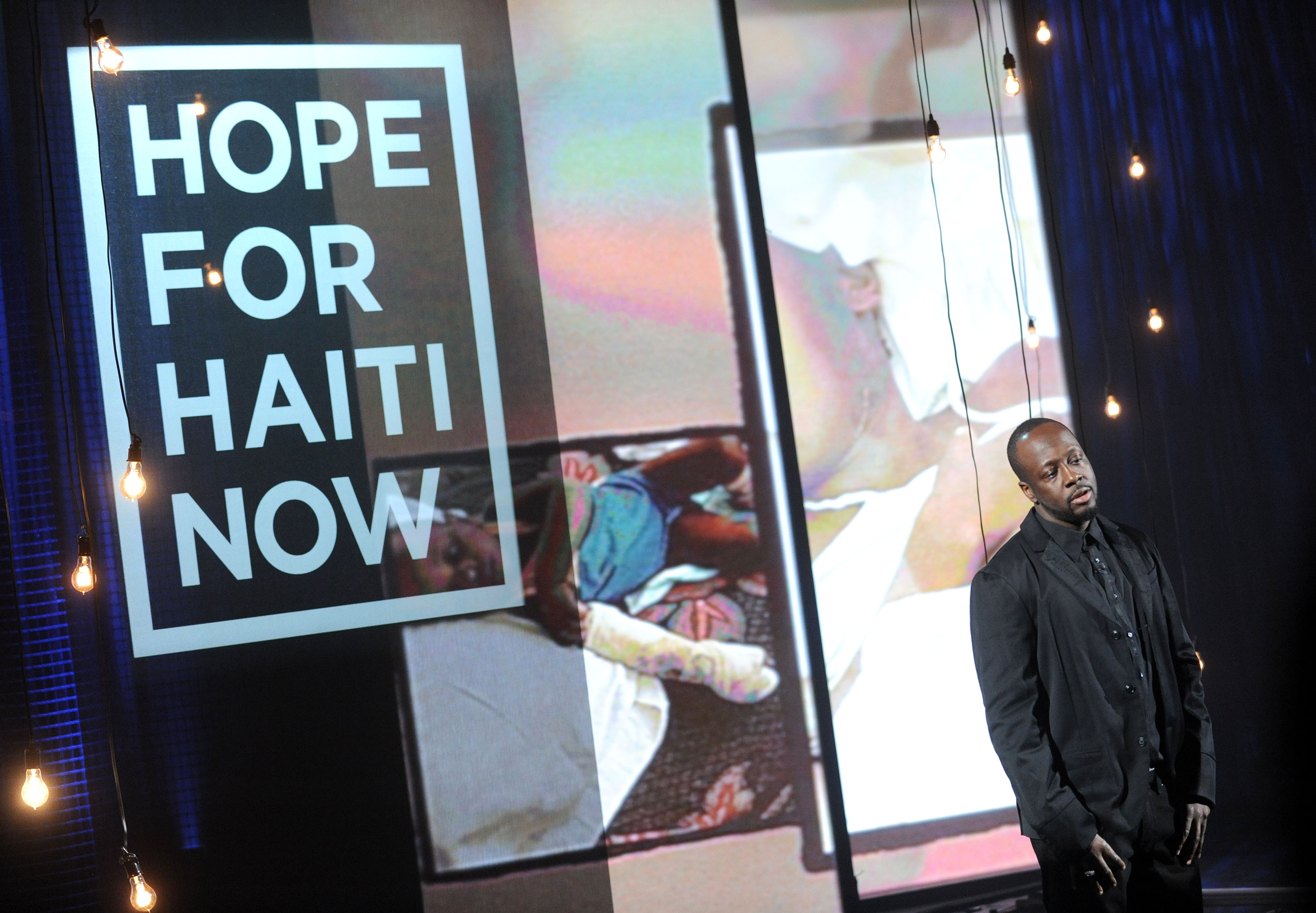 In this image released by Hope for Haiti Now,  Wyclef Jean speaks at "Hope for Haiti Now: A Global Benefit for Earthquake Relief", on Friday, Jan. 22, 2010, in New York. (AP Photo/Evan Agostini/Hope for Haiti Now)