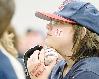 TRIBE DIEHARD: Sarah Welsh holds a baseball during a visit by three Indians players to Akron Children’s Hospital on Market Street in Boardman on Tuesday. She was among the 100 Indians fans who listened to pitchers Aaron Laffey, David Huff and Chris Perez speak on the team’s chances for 2010.
