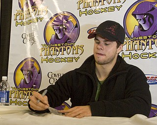 Pittsburgh Penguins Center Tyler Kennedy (48) meets and greets fans at Covelli Centre Friday evening before the Phantoms game against the Sioux Falls Stampede. 