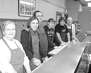 Special to The Vindicator
SERVICE TO OTHERS: Continuing a tradition covering the past 10 years, members of the Rotary Club of Austintown have combined efforts with the Fitch Interact Club to serve dinners at the Rescue Mission on the fourth Monday of each month. Rotary provides ice cream each month as a contribution, and members enjoy the service aspect of the evening. From left to right are Judy Cebriak, Jessica Fercana, Ron Carroll, Brandon Rivello, Zarek Bell, and Tony Cebriak.