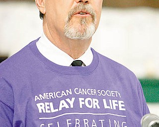 Tom Beasley tells of his life experiences with cancer at St. Patrick School in Hubbard Relay for Life event.