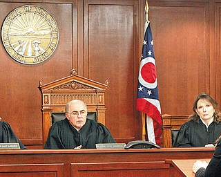 ATTENTIVE JUDGES: Judges Mary DeGenaro, left, Gene Donofrio and Cheryl L. Waite of the 7th District Court of Appeals hear Atty. Rachel Troutman, back to camera, make a last-minute appeal Tuesday for a new trial for Mark Aaron Brown, who faces execution Thursday for the 1994 murders of a North Side convenience store owner and clerk.