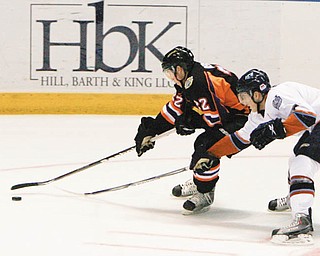 The Vindicator/Robert K. Yosay ----DRIVING MR PUCK - Phantoms #22Adam Berkle dribes pas Ice's Anthony Bitetto . -30-