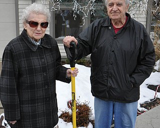 Ann & Alex Wasylychyn of YoungstownÕs West Side get ready to shovel snow at there sonÕs house. Alex is 85-years-old and Ann is 83-years-old.