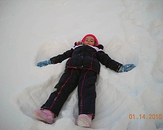Zoe LaRosa, 4, of Boardman, decided to make a snow angel when she and her brother, David, went sled riding for the first time in Poland. She is the daughter of Danielle and David LaRosa..