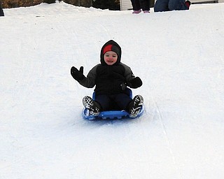 David LaRosa, 2, went sled riding the first time he played in the snow. He is the son of Danielle and David LaRosa of Boardman..