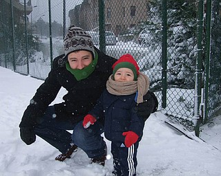 Sinan Emrys Dunn, 18 months, is the son of Drs. Cory (formerly of Liberty Township) and Gulayse Dunn of Istanbul, Turkey, and grandson of Lynn and Dave Dunn of Liberty Township. Grandma says it doesnÕt typically snow there. Sinan didnÕt like it but his daddy did!.
