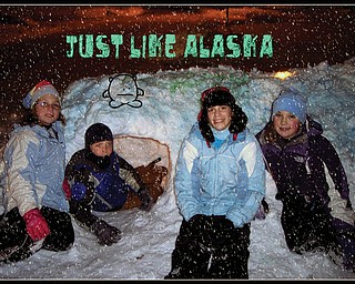 These neighborhood kids built this fort on a Poland Schools snow day. Working very hard as a team on the project are the VanScoter and Walkama children, left to right, Connie, Harrison, Maddison and Mirhanda. The children are both neighbors and very good friends residing on in Poland..