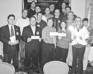 Special to The Vindicator
IN HIGH GEAR: Plans for a fundraising reverse raffle to be March 6 at the Maronite Center have been completed by members of the Rotary Club of Austintown. Tickets for the event are $150 and include appetizers and beverages at 6 p.m. two lavish dinners at 7, and dancing. The cost for the mini board side raffle is $25, and there will be a Chinese auction. Proceeds from the evening will be applied to scholarships, the Woodside Reads Program, dictionaries for all area third graders, library contributions, Junior Achievement programs and local, national and international polio, water and education projects. Prepared for the sale of tickets are, row 1 from left, Dr. Mitch Dalvin, Mike Sciortino, Karl Rein, Deanna Spirko and Rachel Solida; row 2, Toby Mirto, Frank Santisi, Ron Carroll, Bruce Laraway and Hillary Prestridge; row 3, Dave Buttar, Gary Reel and Brian Frederick; and row 4, Michael Cafaro, Bob Senn and Brian Laraway.