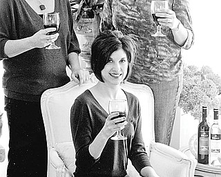 Special to The Vindicator
CHEERS! Toasting to a successful fundraiser are members of the Junior Women’s League of Canfield, as follows: seated, Cari Needs, president; and Danielle Strock and Rhonda Rance, co-chairs.