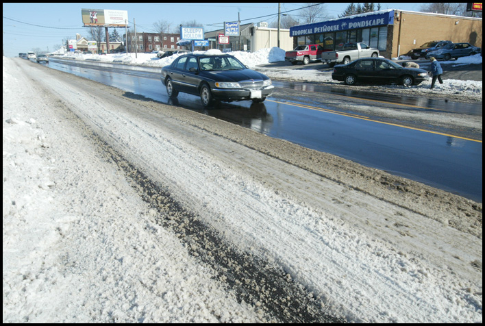 William D. Lewis /The vindicator  Market St in Boardman near Indianola Rd Monday morning. Snow  on street.