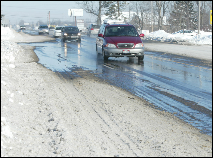 William D. Lewis /The vindicator  Market St in Boardman nearTownship Building Monday morning. Snow  on street.