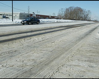 William D. Lewis /The vindicator Snow covered rt 422/MLK blvd leading into youngstown monday morning.