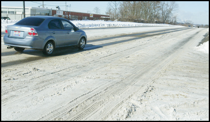 William D. Lewis /The vindicator Snow covered rt 422/MLK blvd leading into youngstown monday morning.