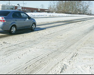 William D. Lewis /The vindicator Snow covered rt 422/MLK blvd leading into youngstown monday morning.