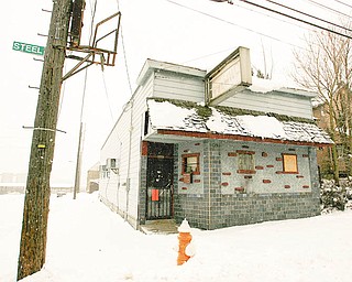 DOG HOUSE CLOSED: The Afro Dogs Motorcycle Club had used this building at 725 Steel St. on the West Side as a social hangout. The building, however, is on the city’s demolition list. Police also found illegal utility use and a stolen motorcycle at the former bar.