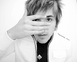 EYES ON THE FUTURE: Justin Joseph Edwards recently released his second album. He will be performing at Salty Grogs in Boardman on Saturday night.