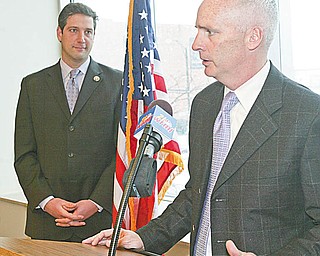 NEW COMPANY: Kevin O’Brien, chief executive officer of Revere Data, announces his company is relocating a research center’s operations from India to downtown Youngstown. Congressman Tim Ryan is at the left.