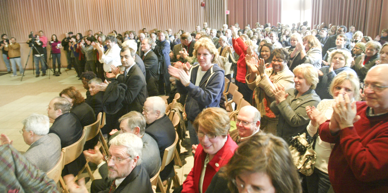 STANDING OVATION: Nearly 500 people in the Chestnut Room at YSU’s Kilcawley Center rose in a standing ovation as trustees announced the selection.