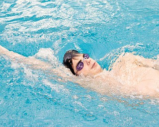 GET BACK: Mooney sophomore Joe Boniface practices backstroke during practice at the downtown YMCA on Tuesday. Boniface will swim the 50-yard freestyle and 100 back at this weekend’s district meet.