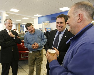   Robert K. Yosay /The Vindicator. Greg Greenwood  David Green Presidnet 1714   listen as Mark Reuss President GM North America  and Jim Graham president 1112 tells about how the Cruze was comfortable and fun to drive as he drove down from Detroit to visit the Austintown Dealership -30-