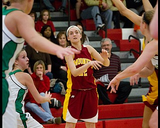 The Vindicator/Geoffrey Hauschild.Mooney's Dominique Zordich (22) makes a pass during the third quarter of a game at Autintown Fitch High School on Wednesday evening..