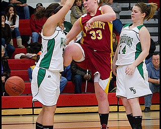 The Vindicator/Geoffrey Hauschild.Mooney's Christine Pelini (33) looses her hold on the ball after colliding with West Branch's Katie Sellaroli (33) and Tia King(14) during the fourth quarter of a game at Autintown Fitch High School on Wednesday evening..