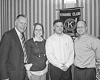 Special to The Vindicator
CRITICAL OPERATION: A report on the critical mission of operating the local Help Hotline effort in the Valley was presented by Todd A Marian, MBA, chief operating officer at the Help Hotline Crisis Center Inc., when he spoke at a recent meeting of the Downtown Kiwanis Club. Marian, second from right above, explained that the center is operated by volunteers and has grown into a 24-hour-a-day, 7 days-a-week comprehensive crisis intervention and community information and referral center. Joining the speaker after the meeting were, from left, Chris McCarty, Kiwanis president; Rachael Ramps, vice president; and Rob Gardner of Stifel Nicolaus/Butler Wick Division, program sponsor.