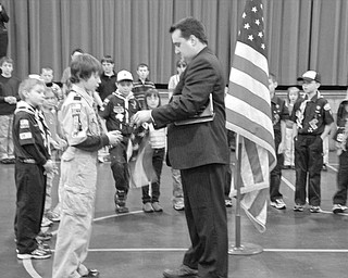 Special to The Vindicator
PRESENTATION: Catholic Schools Week was celebrated at St. Paul School in Salem with a series of special events and programs shared by the students and their families. During a program on Feb. 2, Craig Brown, Columbiana County recorder, presented an Ohio state flag to the school. Accepting the flag on behalf of the student body was Lex Murray.