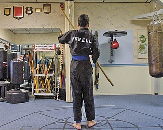 PRACTICING: Ben Powell, 13, pictured, has been a karate student at A.E. Vea Karate for five years. Powell, who has cerebral palsy, said the physical activity helps lessen tightness in his legs caused by the condition.