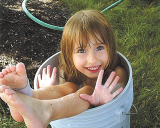 Riley Sweder, daughter of Michael Sweder of Columbus, was caught in somewhat of a predicament when her grandma, Mary Ann Sweder of Struthers, took this picture.