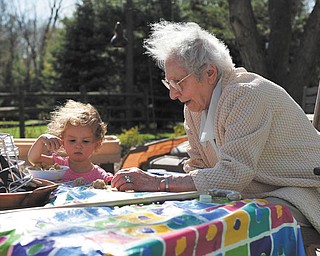Here is a picture of 1-yr-old Hannah LaPlante, 1, and her 94-year-old great-grandma, Adeline DeBartolo, are playing together at a breezy birthday party last spring. Sent by Laurie LaPlante of Poland..