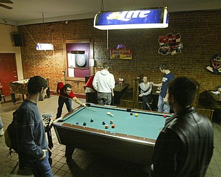 Downtown Draught House is popular place to meet and play pool.