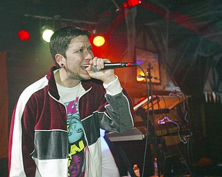 Nick Miller, 31, of Youngstown, a member of the band Foursquare Junkies, performs Friday, Feb. 26, 2010, at Barley's.