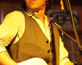 Simon Kenneally, 40, of Youngstown performs at the Lemon Grove during the festival. Kenneally believes Youngstown has a vibrant arts scene.