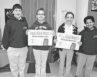 SPECIAL TO THE VINDICATOR
During the past 25 years St. Patrick School in Hubbard has raised $40,000 for St. Jude’s Children’s Hospital by conducting an annual Math-athon. This year students at the school participated in the event and raised $1,076 for the hospital by soliciting pledges from their sponsors and completing the workbooks. Proudly displaying the official math-athon workbooks are, from left, Jack Sebest, Daelyn Lazor, Concetta Seidler and Alex Graham, students in Mrs. Hanni’s 6th grade class at the school.